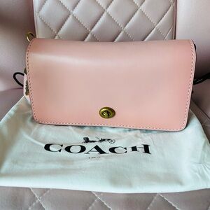 New with tags Coach Dinky in the color Peony